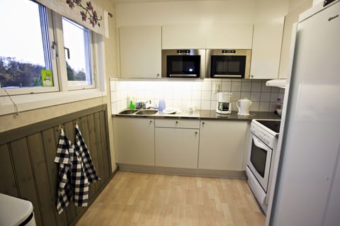 Quadruple Room, Shared Bathroom | Shared kitchen | Fridge, microwave