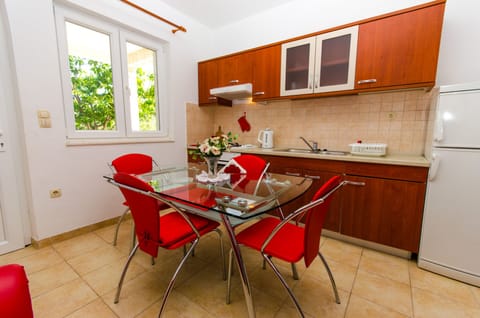 Apartment (Two Bedroom Apartment with Terrace) | Private kitchen | Fridge, electric kettle