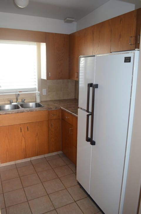 Suite, 1 Bedroom, Non Smoking (4 Double Beds) | Private kitchen | Fridge, microwave, coffee/tea maker