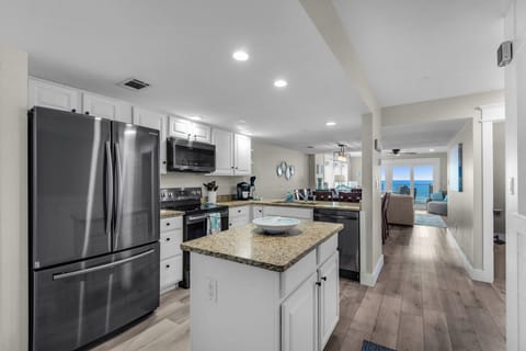 Bright and airy space with modern appliances and stunning ocean views