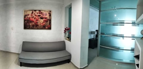 Family Suite, 1 Queen Bed with Sofa bed, Non Smoking, Private Bathroom | Living area | 32-inch Smart TV with digital channels