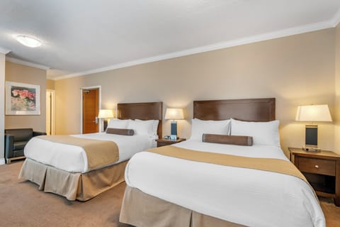 Deluxe Room, 2 Queen Beds, City View | Premium bedding, pillowtop beds, in-room safe, individually decorated