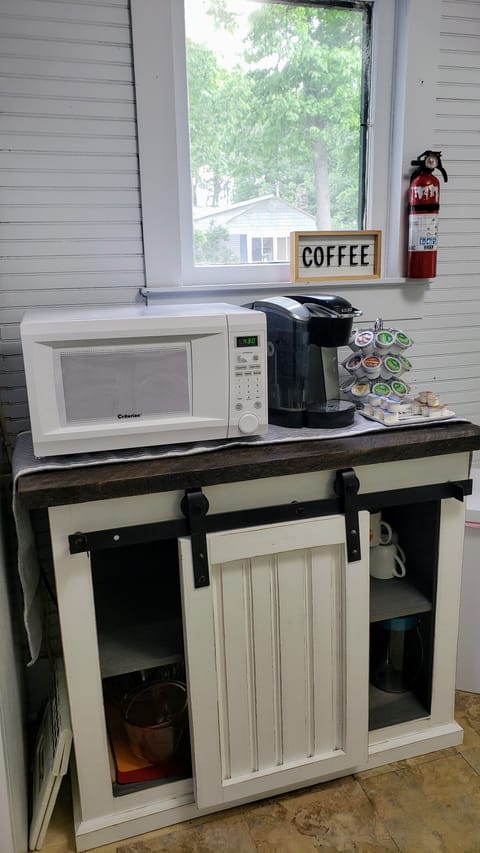 Keurig is fully stocked. Basic cutlery, glassware, and tableware are included.