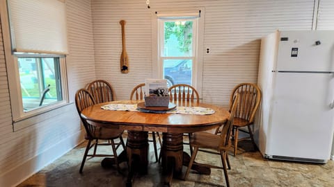 Indoor dining area with seating for 6.