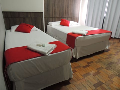 Triple Room, Multiple Beds | Pillowtop beds, desk, free WiFi, bed sheets