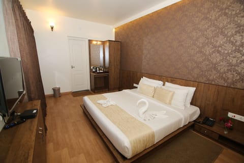 Premium Room | 3 bedrooms, hypo-allergenic bedding, blackout drapes, iron/ironing board