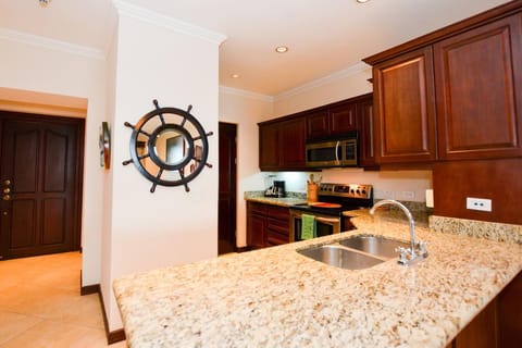 Condo, 2 Bedrooms | Private kitchen | Full-size fridge, microwave, stovetop, dishwasher