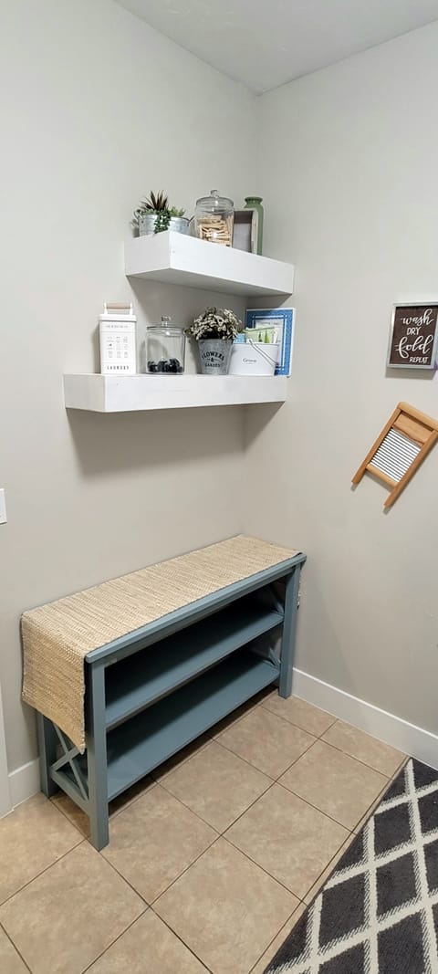 Main floor laundry room, guest table for extra food storage, just off kitchen