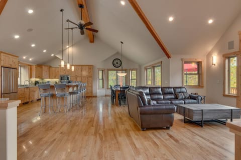 - Open floor plan with vaulted ceilings
- Kitchen, dining, and living space combined
- Tahoe cabin rental with modern family design