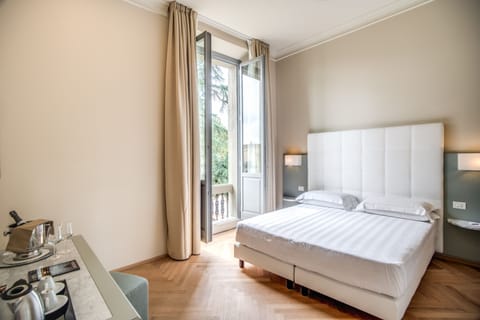 Superior Double or Twin Room, Garden View | Minibar, in-room safe, individually decorated, individually furnished