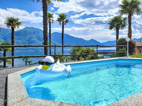 Blue, Swimming Pool, Resort, Mountain Range, Leisure, Eco Hotel, Outdoor Furniture, Resort Town, Tropics