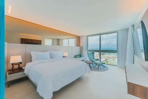 Suite, Non Smoking, Ocean View (2 King & 2 Single Beds) | Premium bedding, memory foam beds, in-room safe, iron/ironing board