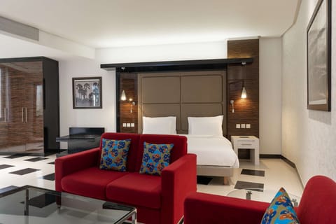 Executive Room | Premium bedding, minibar, in-room safe, desk