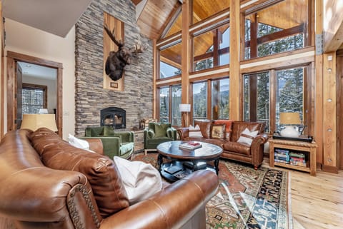 Living area on main level with wood burning fireplace