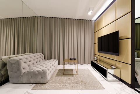 Superior Apartment | Living room | Flat-screen TV