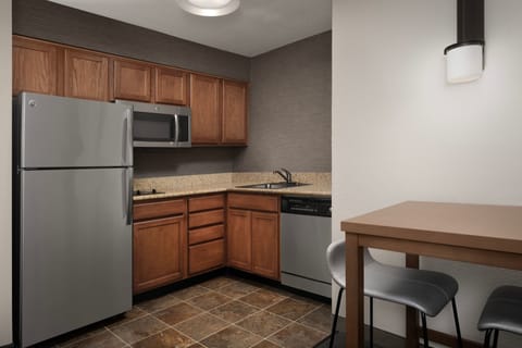 Suite, 1 Bedroom | Private kitchen | Fridge, microwave, stovetop, dishwasher