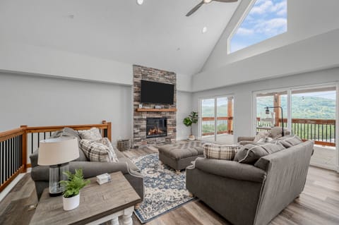 Spacious living area with vaulted ceiling