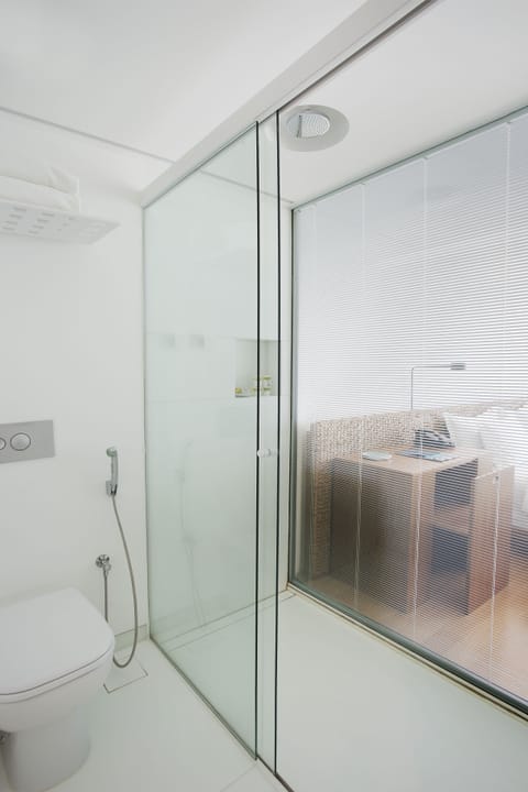 Grand Room, Ocean View | Bathroom | Shower, designer toiletries, hair dryer, bathrobes