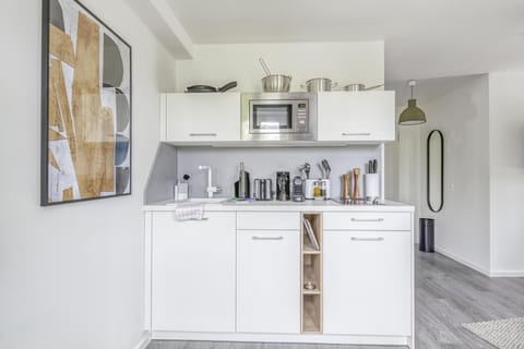 Suite M | Private kitchen | Stovetop, dishwasher, coffee/tea maker, toaster
