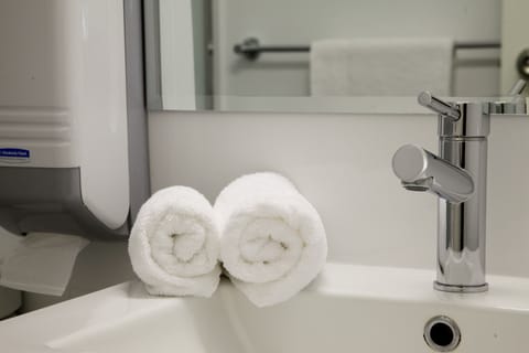 Shower, eco-friendly toiletries, hair dryer, towels