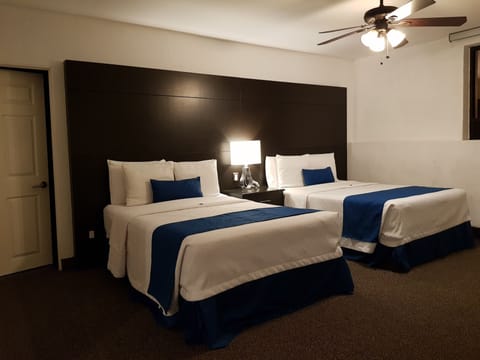 Executive Suite, Multiple Beds | Premium bedding, in-room safe, desk, blackout drapes