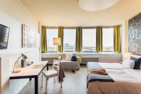 Standard Room, River View (Danube) | Hypo-allergenic bedding, in-room safe, desk, laptop workspace