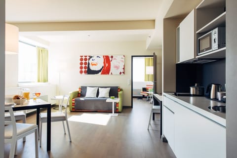 Apartment, 1 Bedroom | Living room | 32-inch flat-screen TV with cable channels, TV