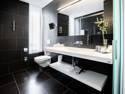 Premium bedding, down comforters, pillowtop beds, free minibar