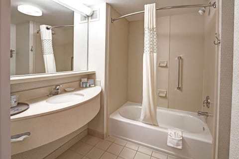 Suite, 1 King Bed, Non Smoking | Bathroom | Hair dryer, towels