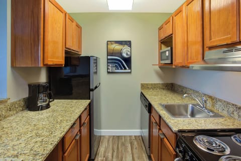 Suite, 1 Bedroom, Non Smoking | Private kitchen | Fridge, microwave, stovetop, dishwasher