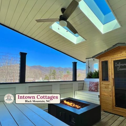 Third floor Sauna deck with gas firepit, stunning views and remote wifi.