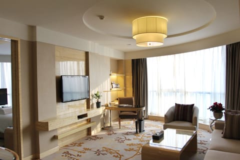 Deluxe Suite, 1 King Bed | Living area | LCD TV
