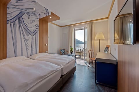 Deluxe Double or Twin Room, 1 Bedroom, Balcony, Lake View | Premium bedding, down comforters, minibar, in-room safe