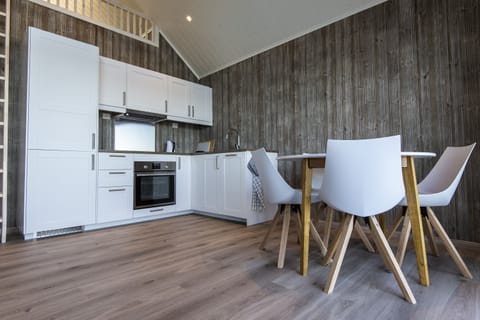 Seaview Rorbu Vega | Private kitchen | Full-size fridge, oven, dishwasher, electric kettle