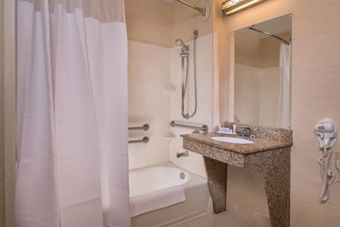 Room, 2 Queen Beds | Bathroom | Combined shower/tub, free toiletries, hair dryer, towels