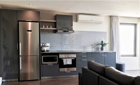 Exclusive Apartment, 2 Bedrooms | Private kitchen | Fridge, microwave, oven, stovetop