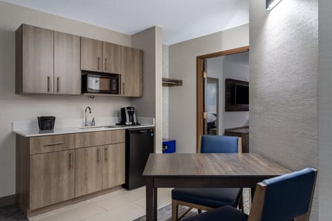 Suite, Multiple Beds | In-room safe, desk, laptop workspace, iron/ironing board