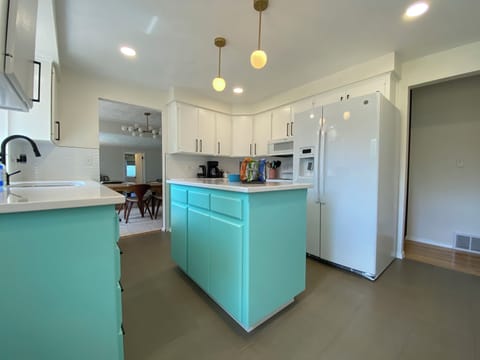 Brightly lit fully stocked Kitchen has everything you need to cook and bake to your heart's content (and your stomach!)