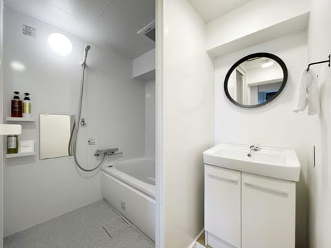 Condo, 1 Bedroom (604) | Bathroom | Combined shower/tub, deep soaking tub, free toiletries, hair dryer