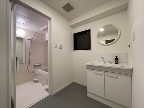 Condo, 3 Bedrooms (4F) | Bathroom | Combined shower/tub, free toiletries, hair dryer, slippers