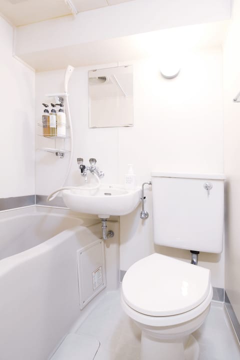 Condo, 1 Bedroom (302) | Bathroom | Combined shower/tub, deep soaking tub, free toiletries, hair dryer