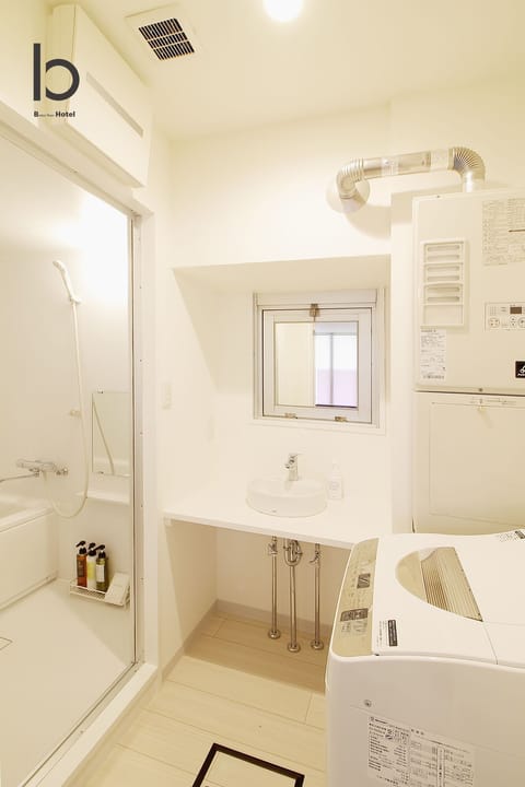 Condo, 1 Bedroom (102) | Bathroom | Free toiletries, hair dryer, slippers, electronic bidet