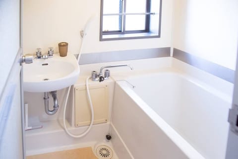 Condo, 1 Bedroom (201) | Bathroom | Combined shower/tub, deep soaking tub, free toiletries, hair dryer