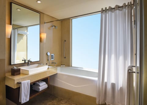 Suite, 1 Bedroom | Bathroom | Hydromassage showerhead, hair dryer, slippers, towels