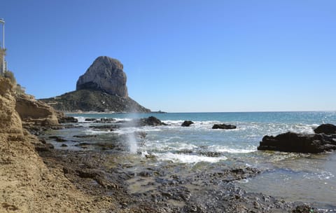 Beach nearby, white sand, beach cabanas, beach towels