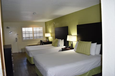 Deluxe Room, 2 Queen Beds, Non Smoking, Refrigerator & Microwave | In-room safe, desk, iron/ironing board, free cribs/infant beds