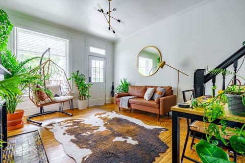 Designed by Jungle House! Step into our living room sanctuary, where luxurious amenities, pristine cleanliness, and the natural allure of indoor plants await your indulgence!