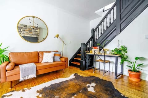 A cozy yet stylish living area where boho vibes meet modern aesthetics—perfect for relaxation and gathering.