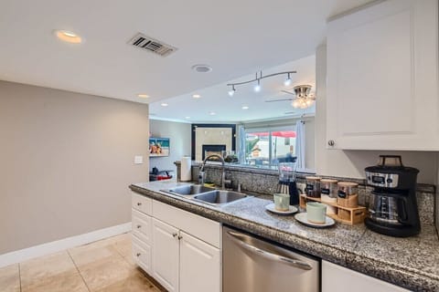 Enjoy the full kitchen with coffee, creamers, mixers, spices, refrigerator, oven, microwave, stove, pots, pans, cooking supplies, cutlery, cups, plates, bowls, utensils, small appliances, and many essentials!