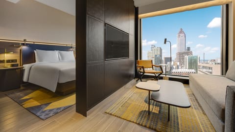 Suite, 1 King Bed | Minibar, in-room safe, laptop workspace, blackout drapes